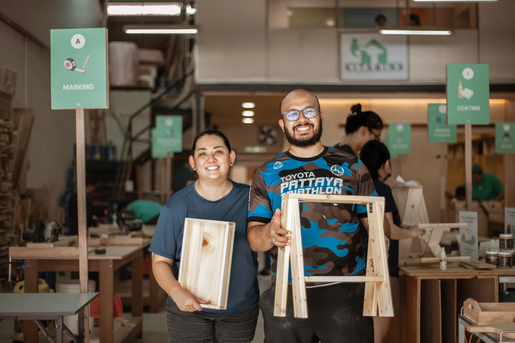 Makers of every age at work on their projects across the KitaBina workshop floor during Pesta Bina